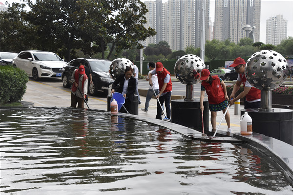 集團公司聯(lián)合商務(wù)區(qū)社區(qū)開展“清潔家園 美化社區(qū)” 主題志愿服務(wù)活動